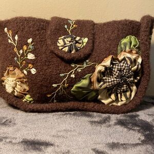 Beautiful embroidery and custom made purse.